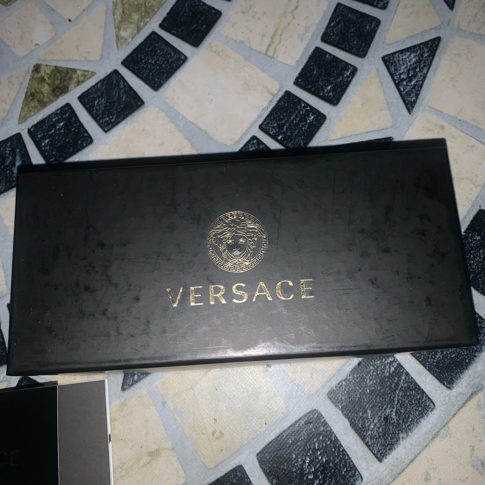 Empty black Versace box with glasses cleaner cloth and authenticity card!